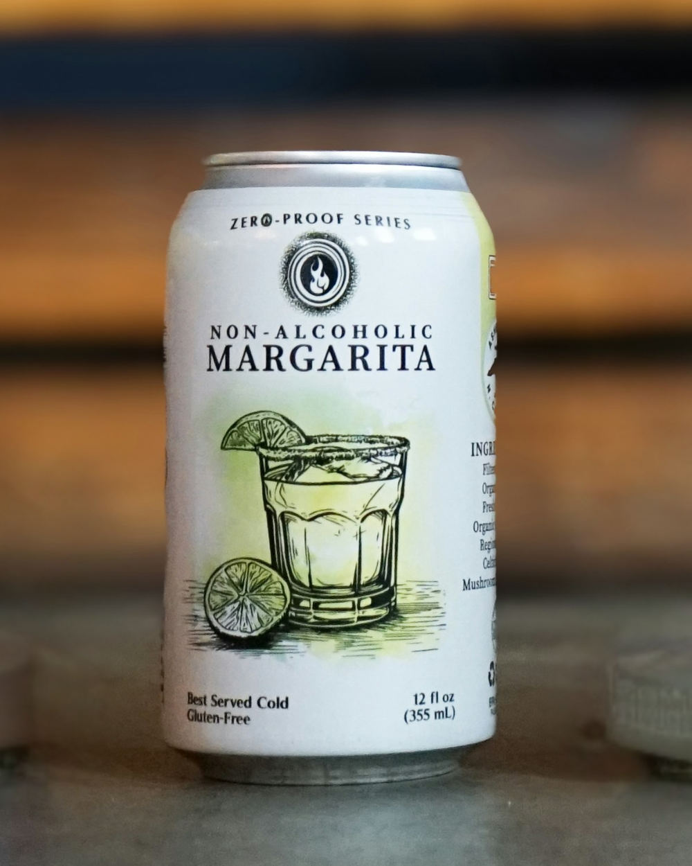 Can of non-alcoholic margarita with lime graphics on a blurred background
